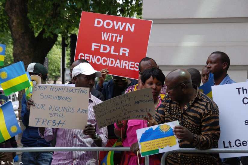 Rwandans protest outside Westminster Magistrates Court in UK on June 25. (Courtesy)