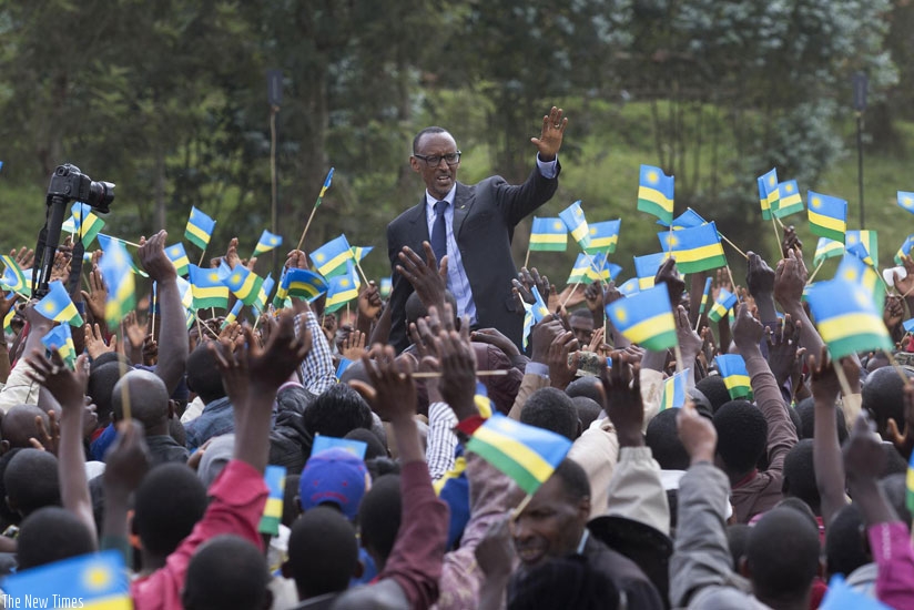 President Kagame waves to excited residents of Rubaya during the 21st Liberation celebrations yesterday. (Village Urugwiro)