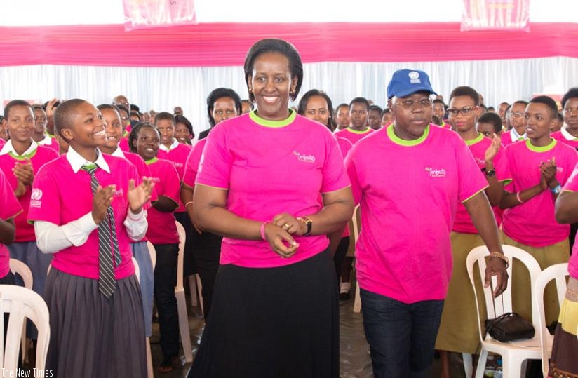 First Lady Jeannette Kagame (L), together with UN Resident Coordinator Lamin Manneh, arrive at Petit Stade in Remera, yesterday, at an event to celebrate 10 years of inspiring Rwandan girls to excel at school. (Courtesy)