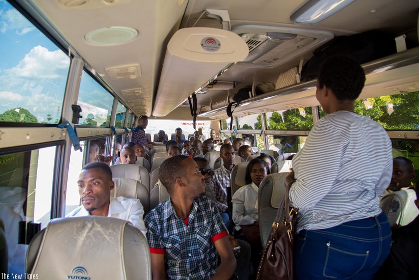 Some of the trainers in the bus ready to set off for Gabiro Combat Training School. (Doreen Umutesi)
