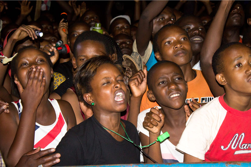 Fans showing love to their favorite artists. (Fernand Mugisha)