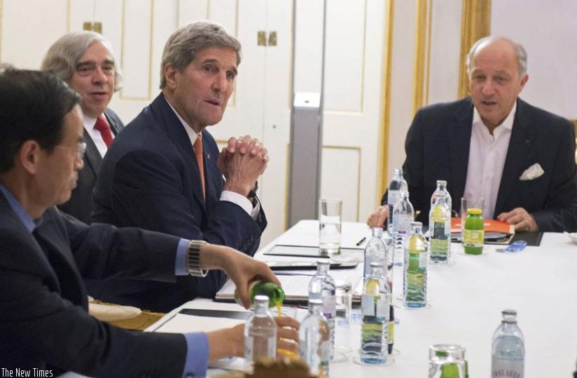 U.S. Secretary of State, John Kerry, third from left, U.S. Secretary of Energy, Ernest Moniz, second from left, and French Foreign Minister, Laurent Fabius, right, at the nuclear talks in Vienna, Austria. (Internet photo)