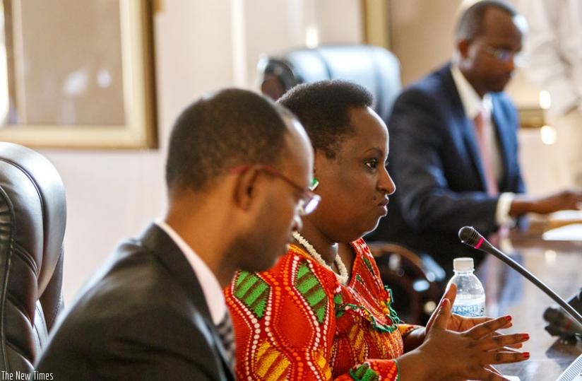Dr Usta Kayitesi, the vice chairperson of the Rwanda Biomedical Centre board of directors (C), explains the challenges the centre has been facing in its operations while appearing before the parliamentary Public Accounts Committee (PAC) yesterday. (Timothy Kisambira)