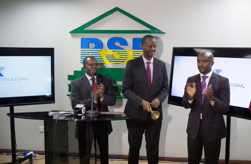 (L-R) Capital Markets Authority Executive Director Robert Mathu, Jack Kayonga and RSE CEO Celestin Rwabukumba at the listing. (Timothy Kisambira)
