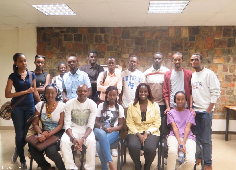 Young Writers' Club members pose for a photo after the inaugral meeting in Kigalion Wednesday. (Julius Bizimungu)