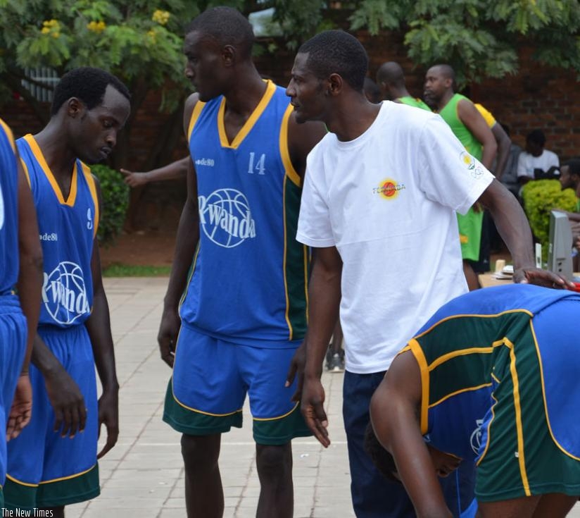 Patriots coach Cyrille Kalima gives instructions to his players during a regular season game against UGB. (Sam Ngendahimana)