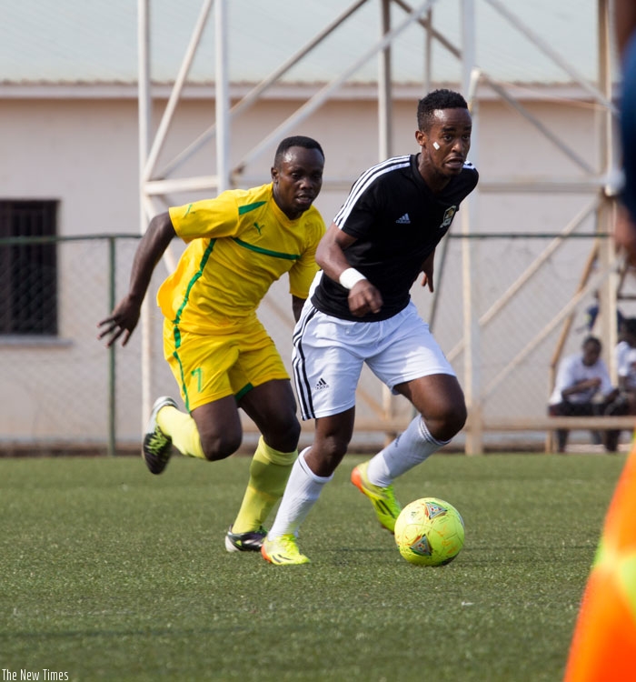 APR's Yannick Mukunzi (with the ball) during last year's final against Sudan's El Merreikh at Amahoro Stadium in Kigali. File