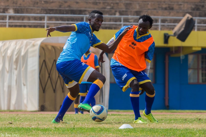 Midfielder Imran Nshimiyimana (L) brings physique to the new look Amavubi side. (Timothy Kisambira)