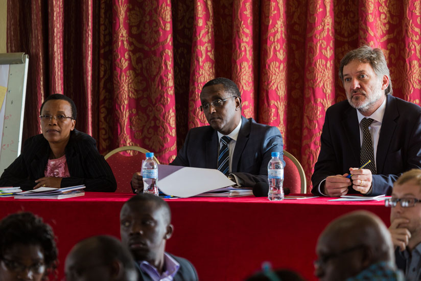 Dr. Rose Mukankomeje, the Director General of REMA (L), Natural Resource Minister Vincent Biruta (C), together with Carl Wesselink, Regional Director of Climate and Development Knowledge Network, during the meeting. (Timothy Kisambira)