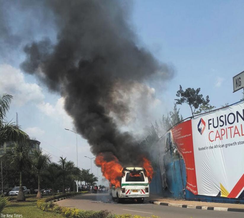 A commuter taxi that burst into flames last year in Kacyiru.  Some insurers are still underpricing motor vehicle third party policies, a vice that is hurting the sector. (File)