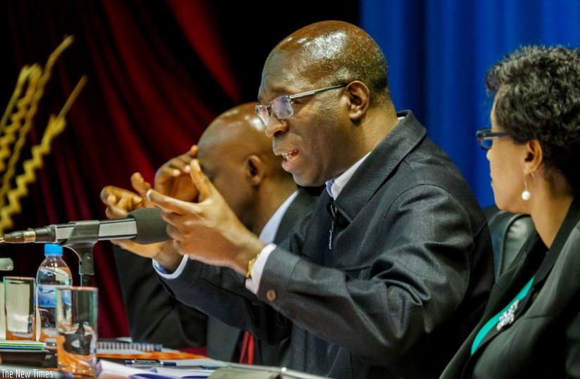 Premier Anastase Murekezi gives his remarks during the meeting with local government leaders at the Office of the Prime Minister in Kigali yesterday. (Timothy Kisambira)