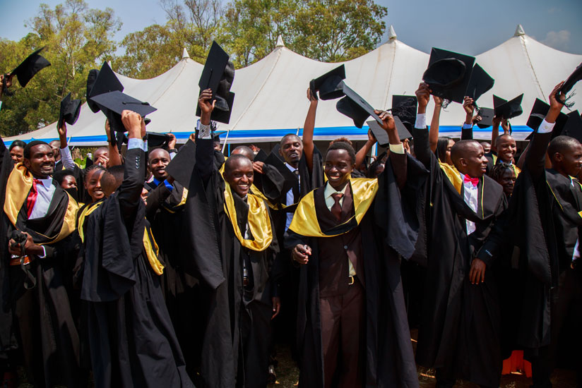 Students of University of Rwanda College of Education celebrate after their names had been read out during the graduation ceremony on Monday.