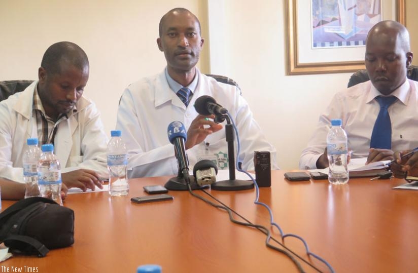 Dr Mugabo (C) and other medics address journalists at King Faisal Hospital, Kigali, on Monday. (R. Muriisa)