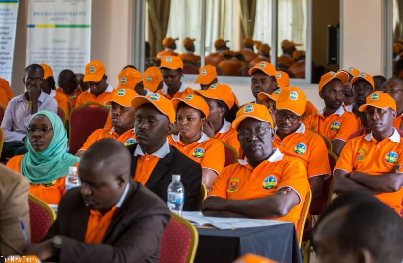 Members of cooperatives follow proceedings at  the meeting in Kigali yesterday. (Timothy Kisambira)