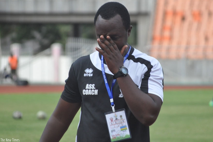 APR assistant coach Vincent Mashami looks distraught after yesterday's heavy defeat to Al Khartoum at the ongoing CECAFA Kagame Cup. (Courtesy)