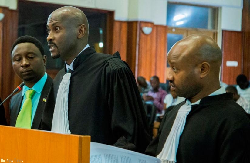 Green Party president Habineza (L) in the dock as state attorneys Epimaque Rubango (C) and Theophile Mbonera make their case at the Supreme Court yesterday. (Courtesy)