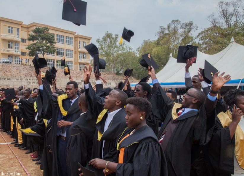 Graduates celebrate after being awarded degrees at yesterday's ceremony.  (Faustin Niyigena)