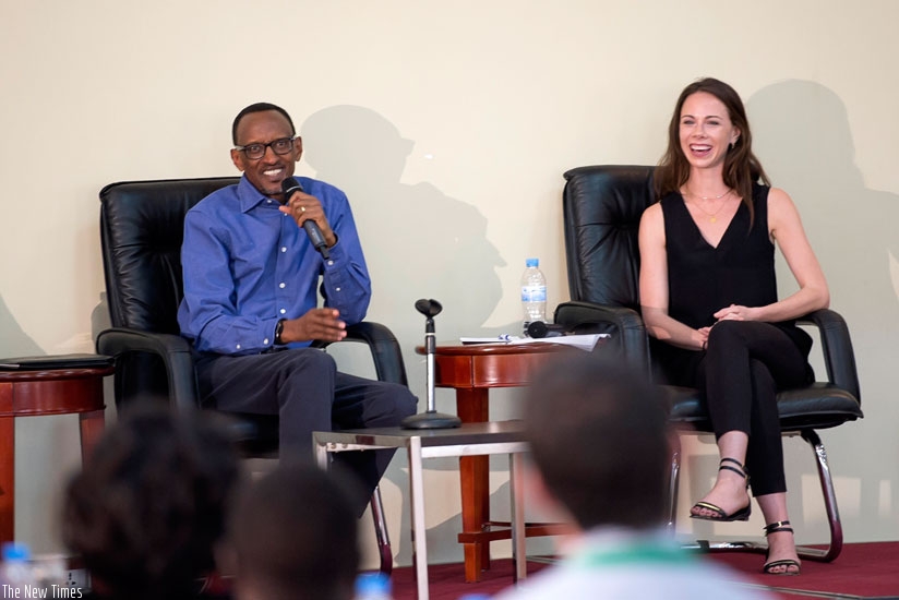 President Kagame addresses Rwandan and international fellows of the Global Health Corps in Nyamata town yesterday. On the right is Barbara Bush, the daughter of former US president George W. Bush. (Village  Urugwiro)