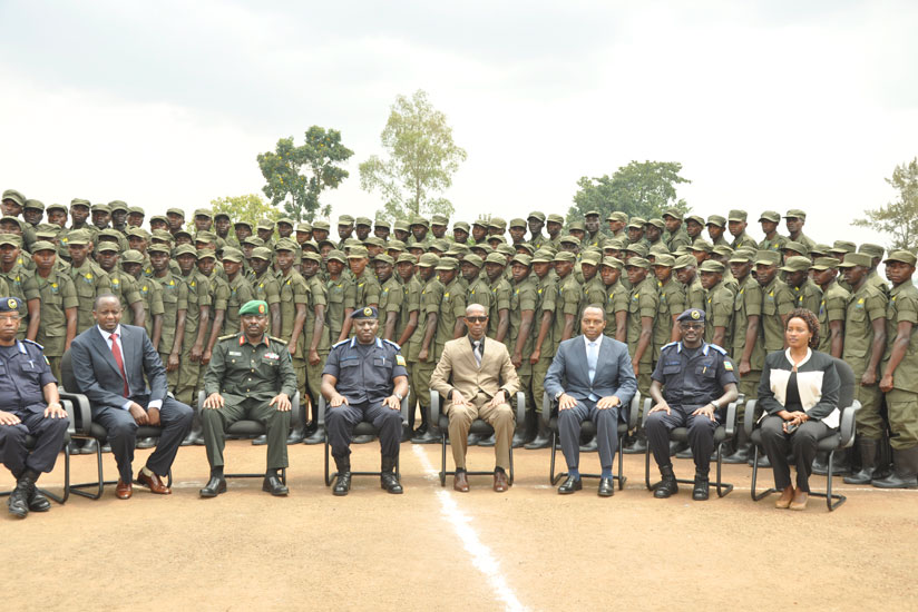 Minister of Internal Security, Sheikh Musa Fazil Harerimana, the Inspector General of Police Emmanuel K. Gasana, the CEO of Rwanda Development Board (RDB), Francis Gatare, and several other dignitaries during the graduation ceremony at Police Training School in Gishari