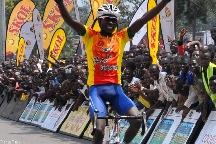 Jean Bosco Nsengimana celebrates as he crosses the finish line on the way to winning the Northern Circuit race yesterday. (Peter Kamasa)