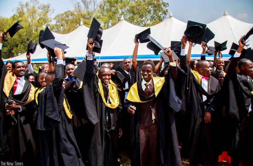 Graduates celebrate after being conferred upon with degrees at University of Rwanda last t         week. (File)