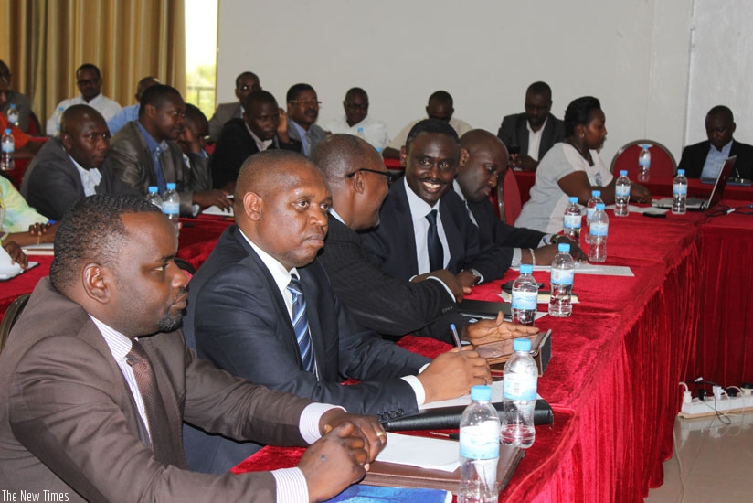 Representatives of government and development partners at the meeting in Kigali. (Frederic Byumvuhore)