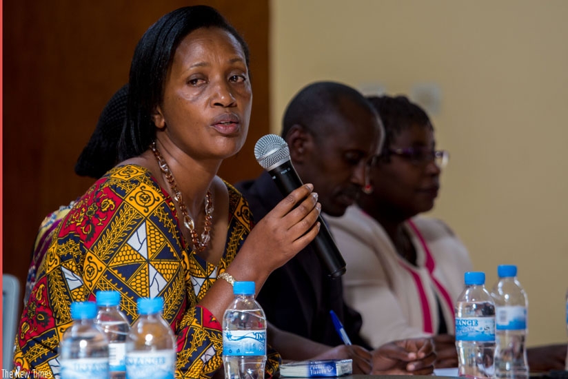 Senate vice-president Jeanne d'Arc Gakuba (L) addresses lawyers, researchers and clerics at the College of Education yesterday. (All photos by Timothy Kisambira)