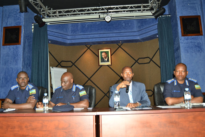 The Minister of Internal Security, Sheikh Musa Fazil Harerimana addressing the Police High Council flanked by the Inspector General of Police (IGP) Emmanuel K. Gasana (Left) the Deputy Inspector Generals, Dan Munyuza (Far Left) and Juvenal Marizamunda (Right)