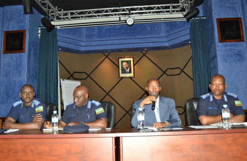 The Minister of Internal Security, Sheikh Musa Fazil Harerimana addressing the Police High Council flanked by the Inspector General of Police (IGP) Emmanuel K. Gasana (Left) the Deputy Inspector Generals, Dan Munyuza (Far Left) and Juvenal Marizamunda (Right). (Courtesy)