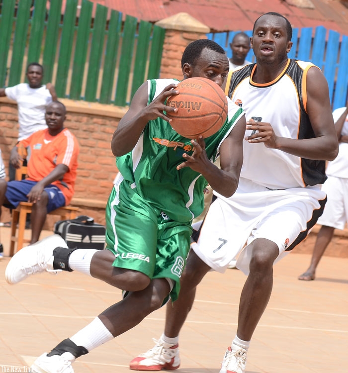 Espoir coach Bahufite has challenged his key players, including team captain, Aristide Mugabe (L),  to improve their game today. (File)