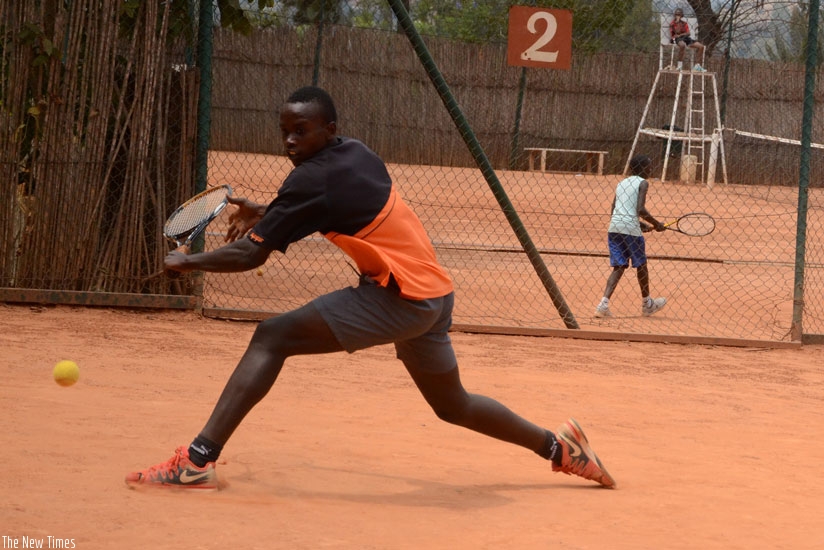 Teenager Fabrice Tuyishime edged 31-year old veteran Elie Bahizi in the first round of the Umubano Hotel Tennis Open yesterday. (S. Ngendahimana)