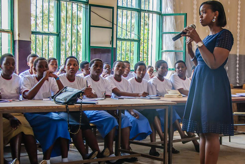 Rose Busingye, a facilitator from Institute for Economic Empowerment of Women speaks to students during a mentorship conference recently (Courtesy)