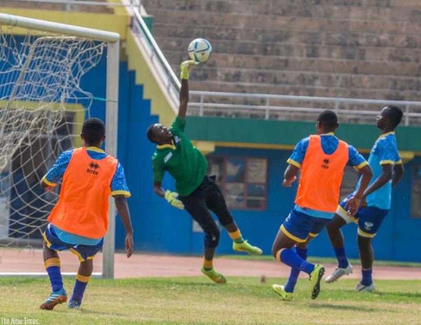 Amavubi goalkeeper Eric Ndayishimiye makes a save during a training session. Rwanda will face Ethiopia in a friendly on August 28. (S. Ngendahimana)