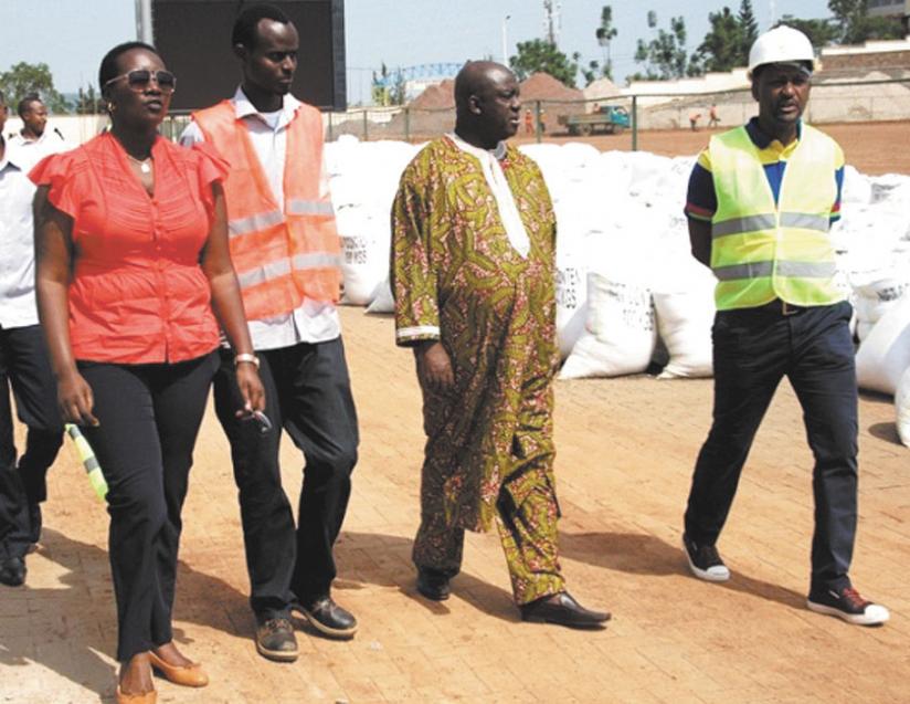 The Minister of Sports and Culture UWACU Julienne (L), FERWAFA president Vincent Nzamwita (R) along with CAF officials on their last visit and inspection of Kigali regional stadium. (File)