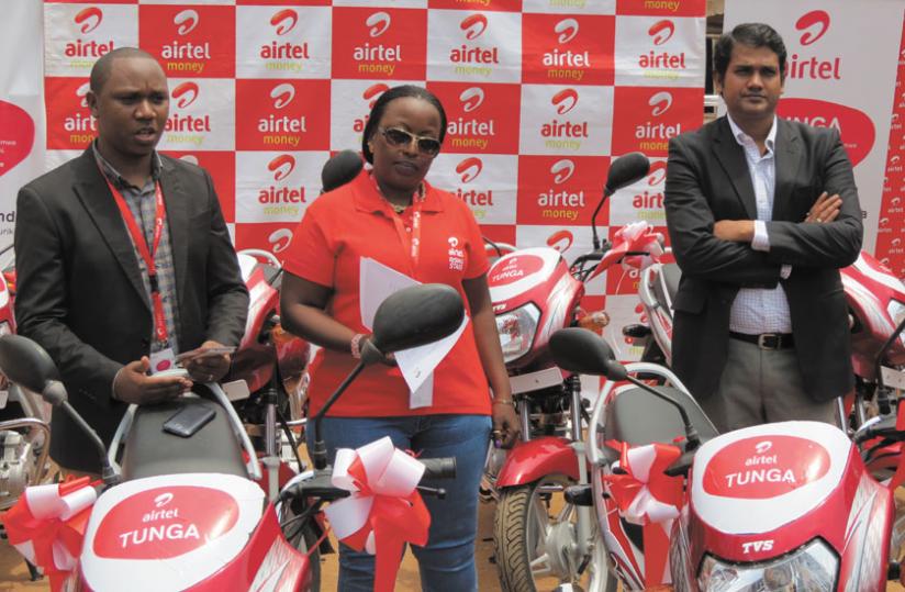 L-R: Chrysanthe Turatimana, the Airtel data, devices and value added services manager, Clementine Nyampinga brand and communications manager and Singh at the launch of the 'Tunga' promotion. (Courtesy)