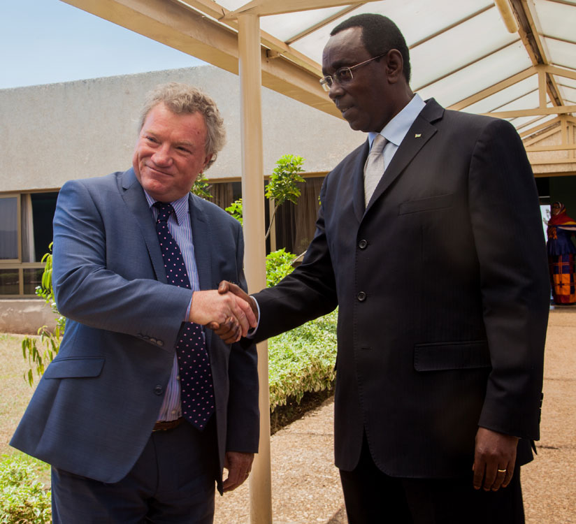 EU Ambassador to Rwanda Michael Ryan shakes hand with Senate President Bernard Makuza at the parliament yesterday after their meeting. (All photos by Faustin Niyigena)