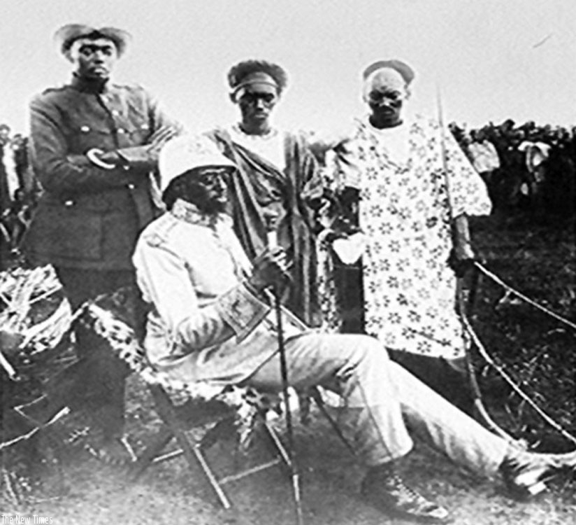 King Musinga (seated) and Rudahigwa (left) standing. (Courtesy)