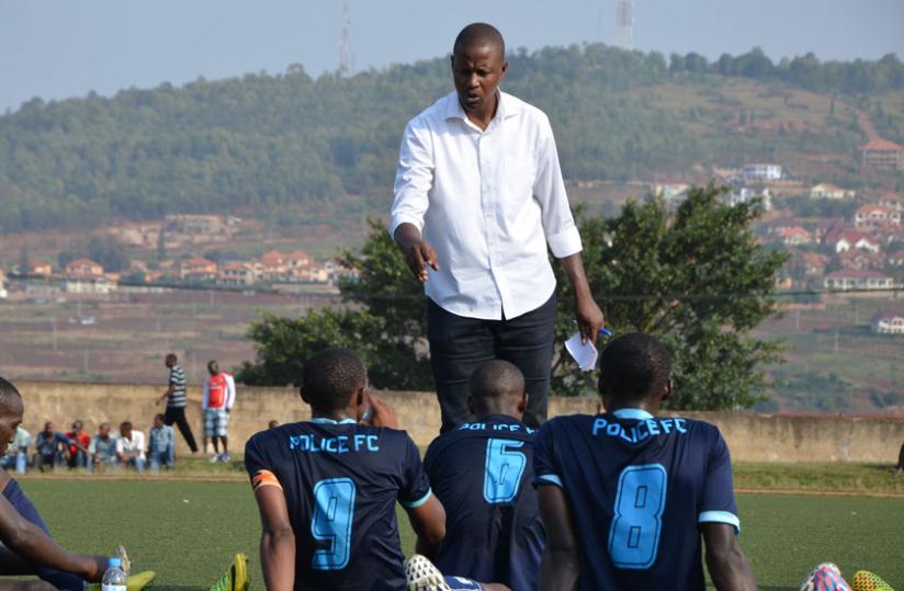 Casa Mbungo talks to Police players at half time during a league match with SC Kiyovu last season. (File)