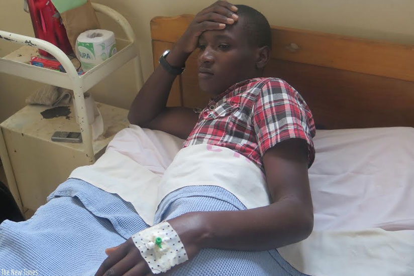 Agaba lies on his hospital. He is still recovering after undergoing an operation recently. (Solomon Asaba)