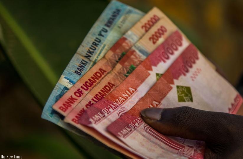 Some of East Africa's currencies. The governors agreed to fast-track currency convertibility in the region as a means of strengthening regional currencies. (Timothy Kisambira)