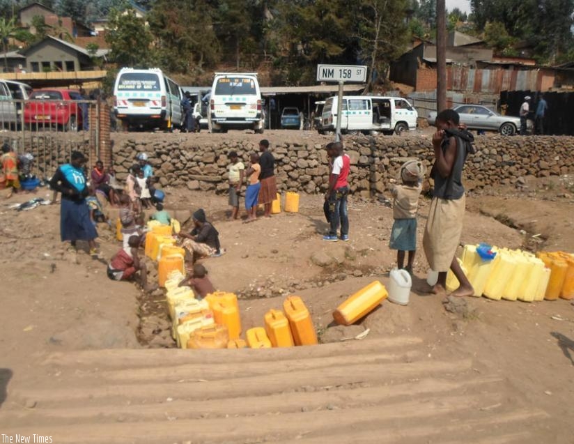 Musanze residents at a water point this week. (Jean Fidele Ndungutse)