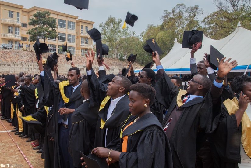 University of Rwanda's College of Business and Economics graduates celebrate after getting their degrees. The university is keen on improving its global rankings. (File)