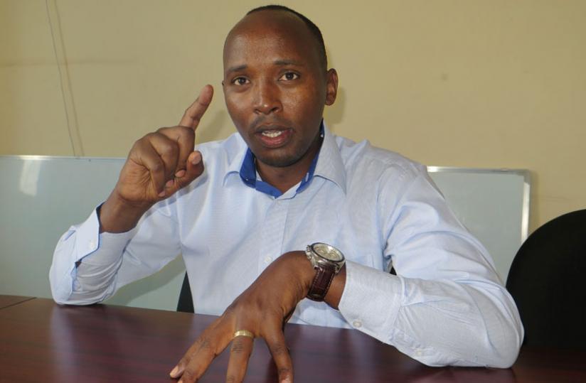 Dr Nsanzimana  makes a point during the interview. (Solomon Asaba)