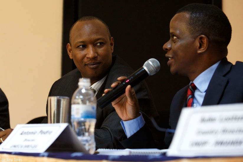 Antonio Pedro, the country-director, United Nations Economic Commission for Africa, speaks at the energy stakeholders meeting in Kigali yesterday. Looking on is Christian Rwakunda, the permanent secretary at the Ministry of Infrastructure. (Timothy Kisambira)