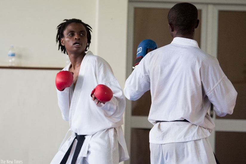Solange Ingabire and the new national team coach Noel Nkuranyabahizi during a past training session before the latter retired to take on coaching duties. (File)