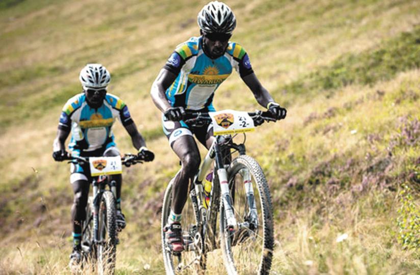 Byukusenge (front) competes at the Cape Epic thrice in 2013. (Net photo)