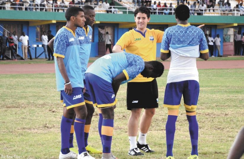 McKinstry talking to his players during yesterday morning training session at Amahoro stadium. The Irishman is concerned with the state of the Amahoro pitch. (S. Ngendahimana)