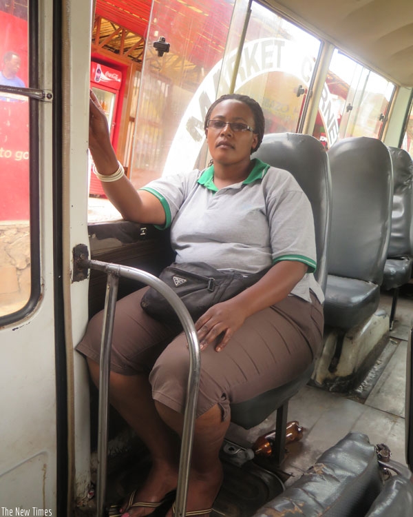 Umuhoza was captured by our camera as she went about with her work. (Lydia Atieno)