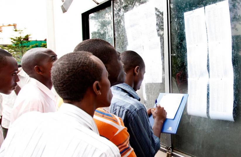 University students check for their results at the notice board. (File)