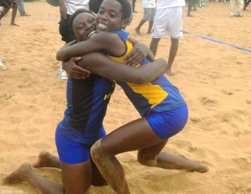 Charlotte Nzayisenga and Denyse Mutatsimpundu celebrate after winning in a past event. (File)